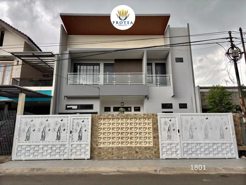 Rumah Minimalis Modern dengan Kolam Renang di di Jalan Utama