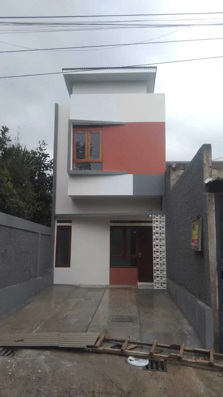 RUMAH DUA LANTAI PINGGIR JALAN, harga include sumur sibel