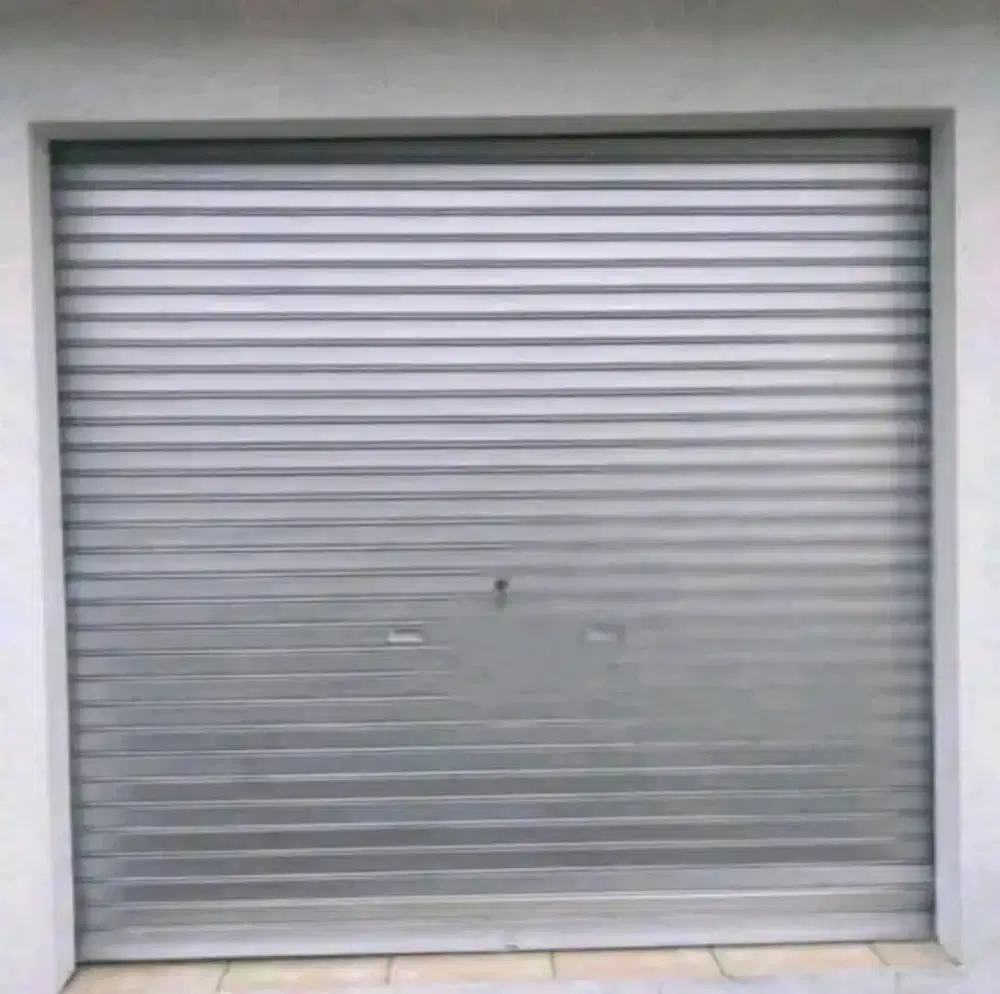 Tukang pasang dan service rolling door murah