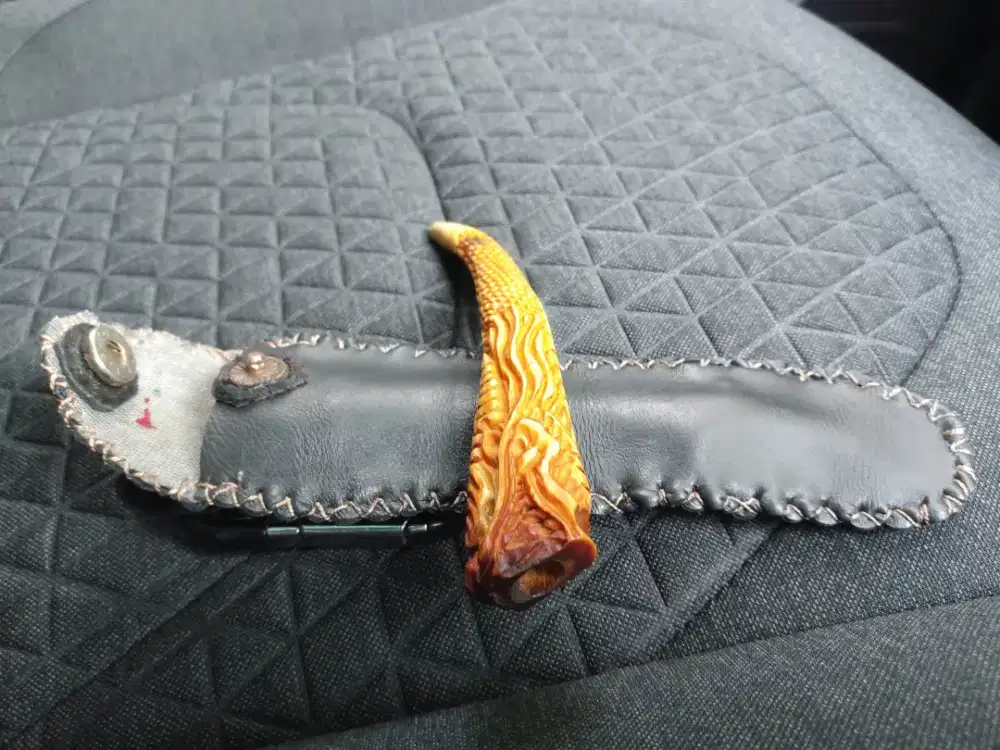 Once(cangklong) ukir naga T.Rusa