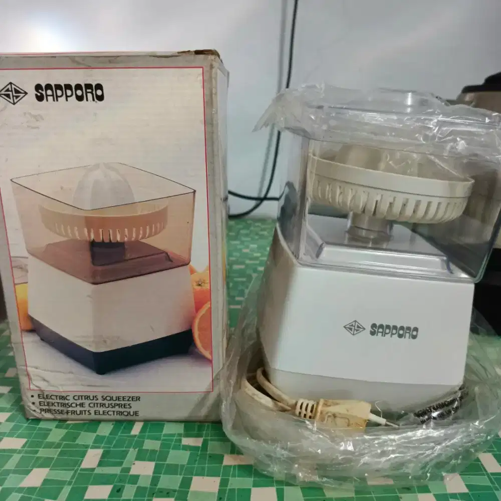 Sapporo pemeras jeruk elektrik