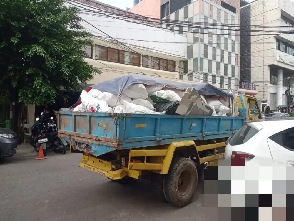 Jasa buang tanah dan puing