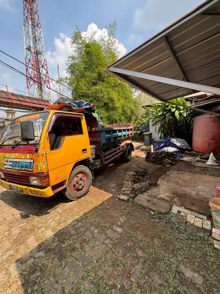 Jasa buang sampah murah & jual urugan puing