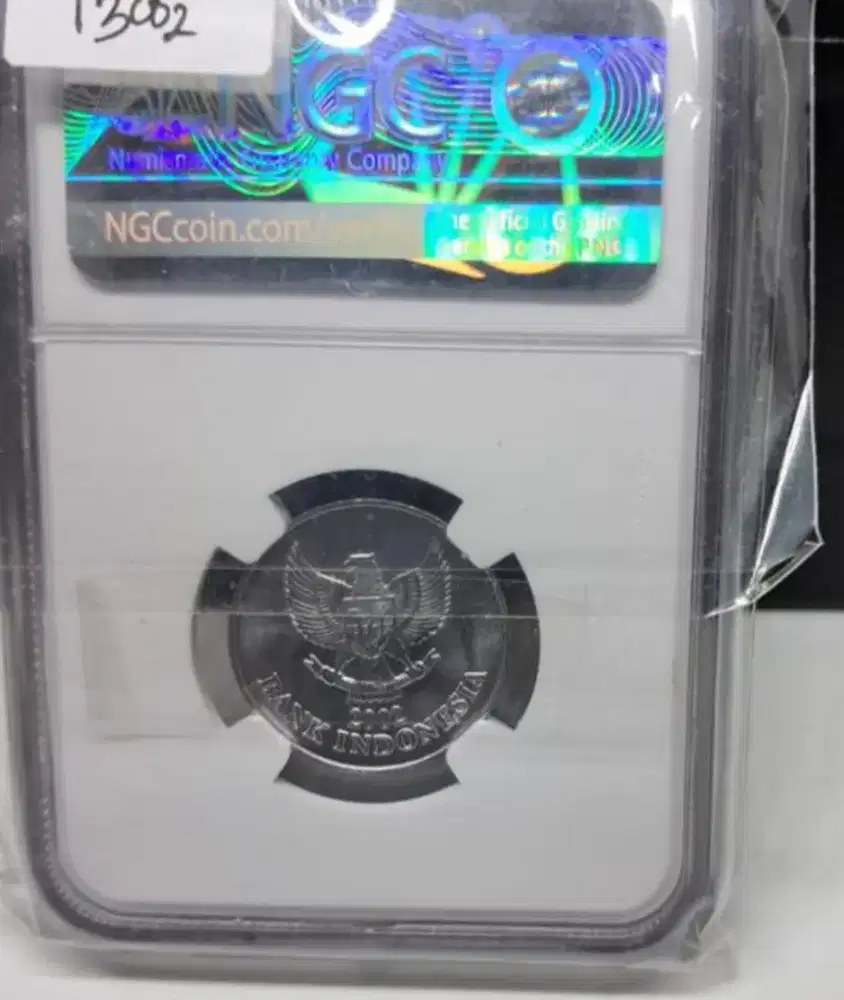 Grading NGC 100 rupiah