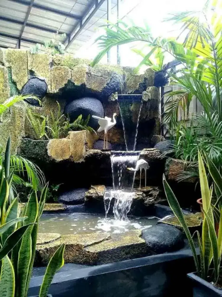 Jasa pembuatan kolam ikan relif tebing