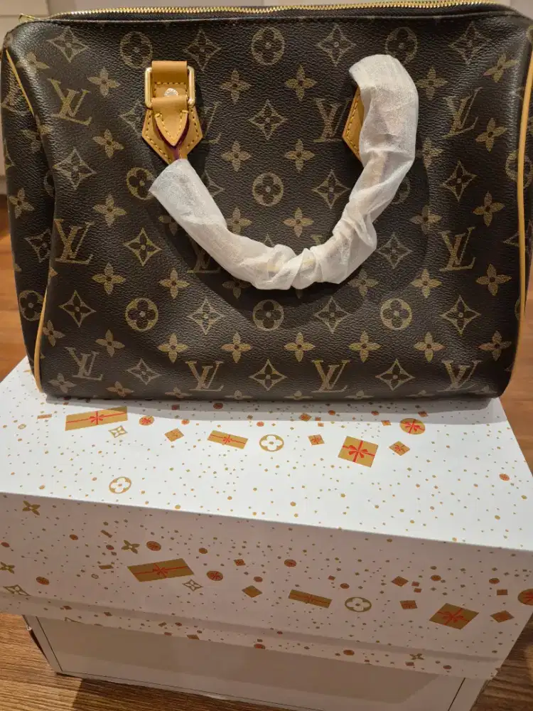 Tas lv dan dior masih baru jual rugi