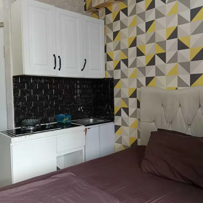 The green apartment pramuka city studio mall
