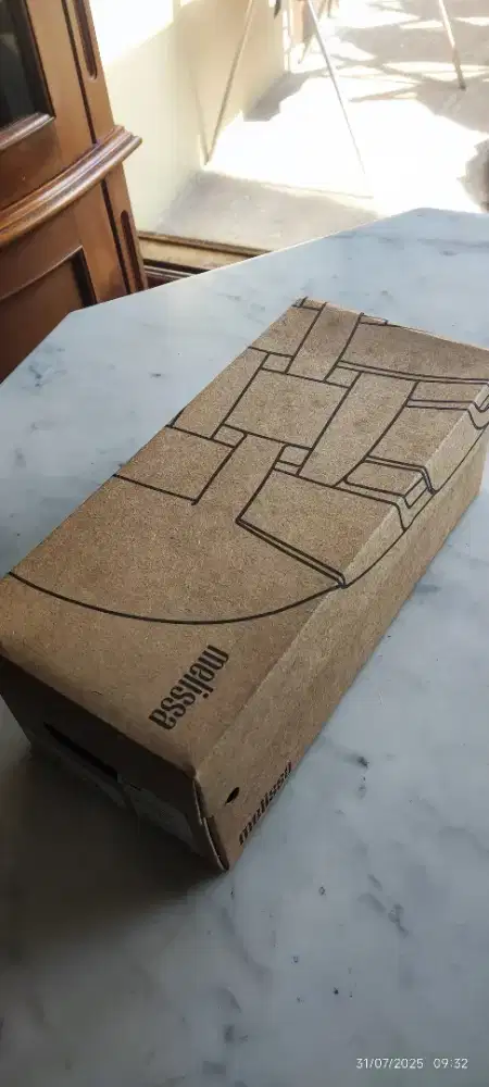 Sepatu Melissa bekas