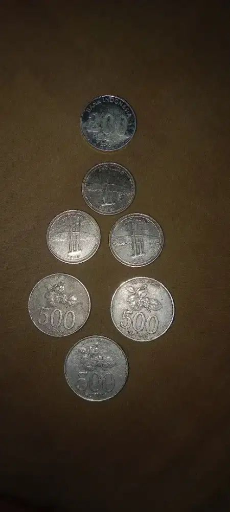 Uang koin angklung dan melati