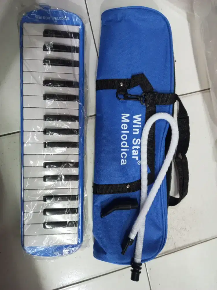 Mainan anak pianika Tiup win star biru