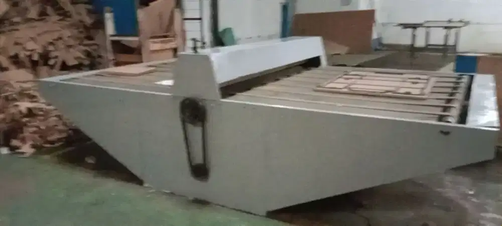 Mesin pond roll kardus otomatis