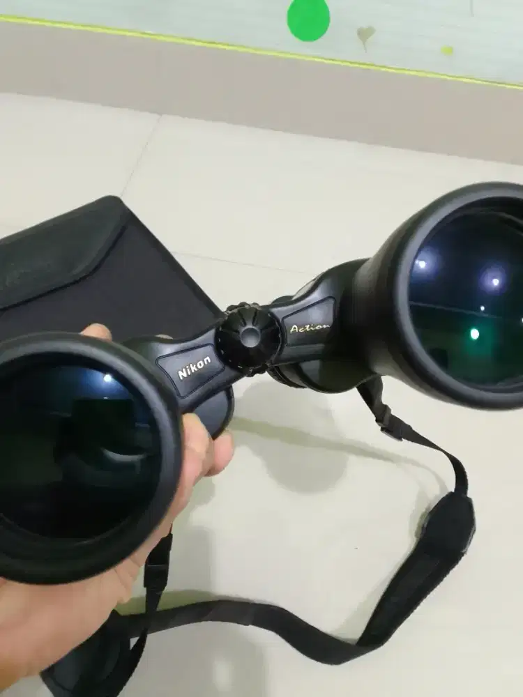 Teropong Binoculars Nikon Action Zoom 10-22x50 CF
