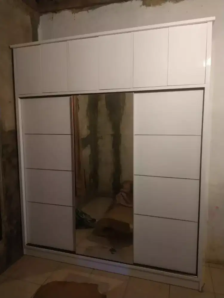 Lemari sleding 3 pintu