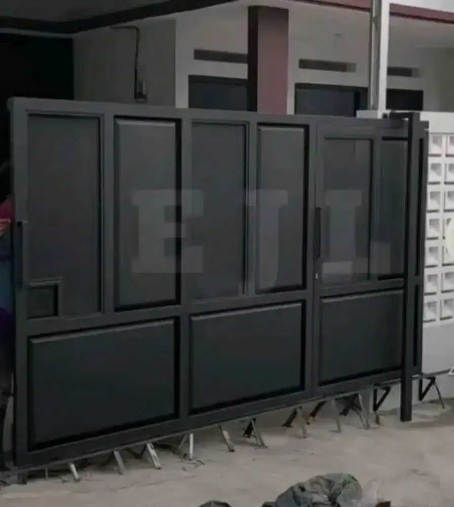 Pagar plat warmes n plat bolong minimalis