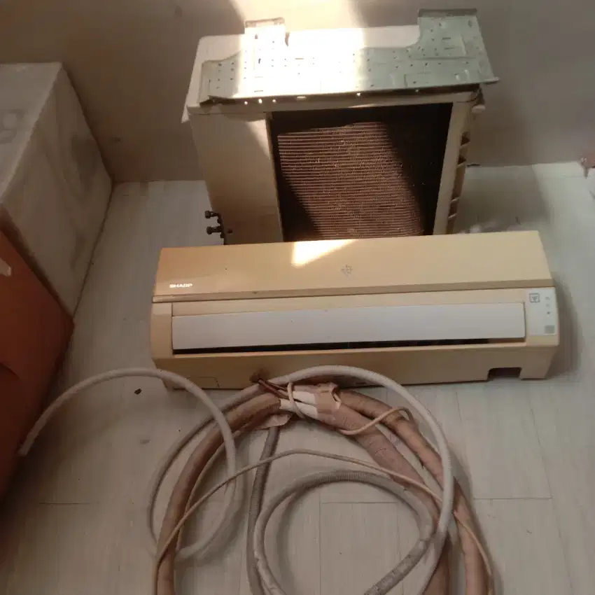 AC Sharp 1 PK Normal dan Dingin