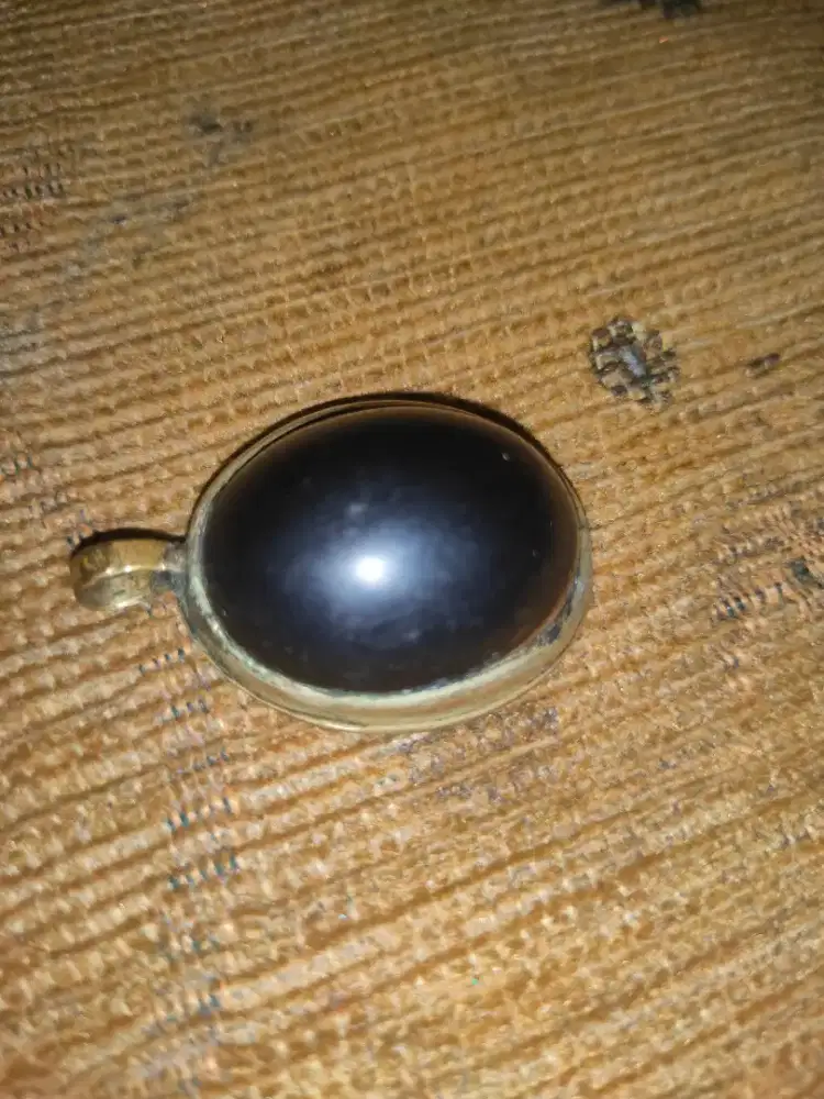 Liontin posil galih kelor lawasan