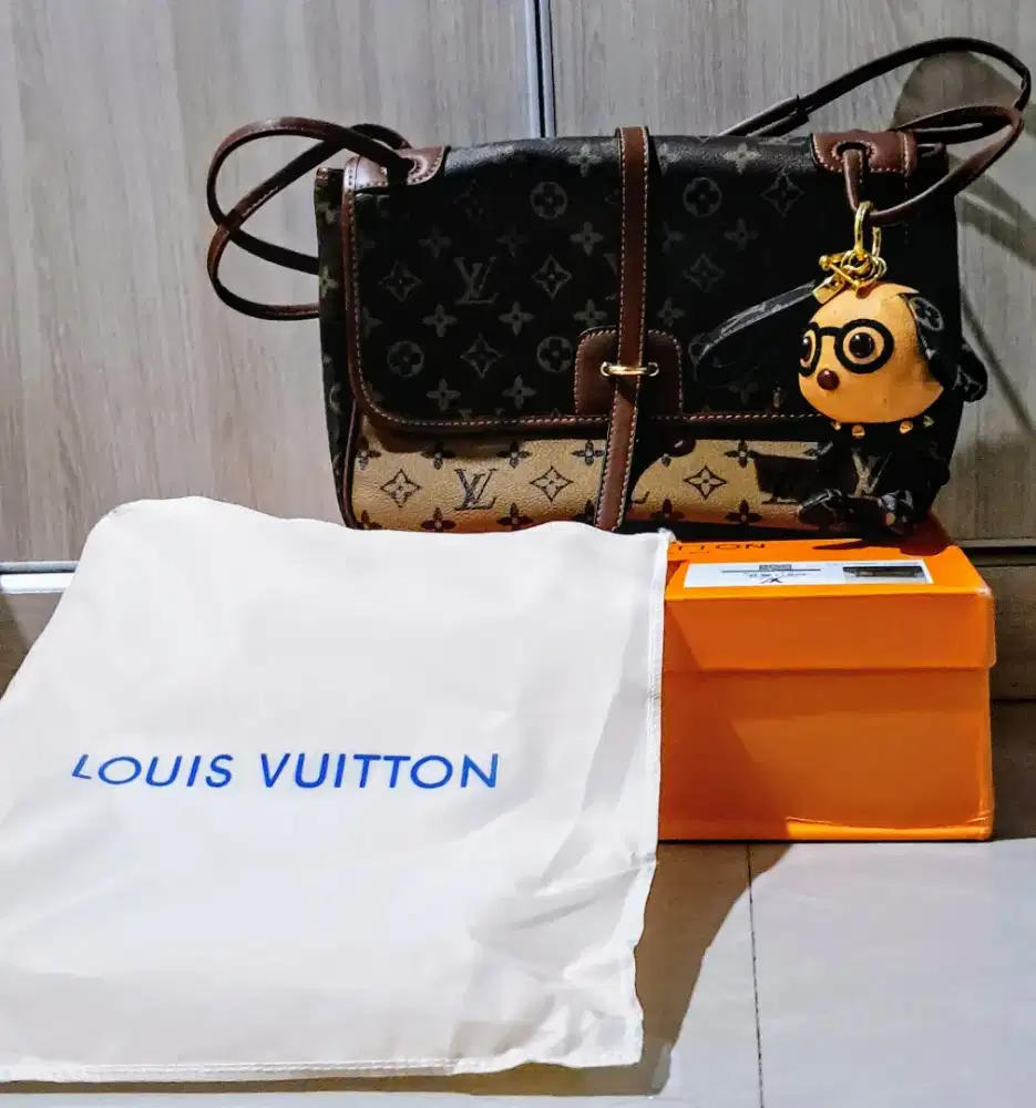 Tas kulit import YSL