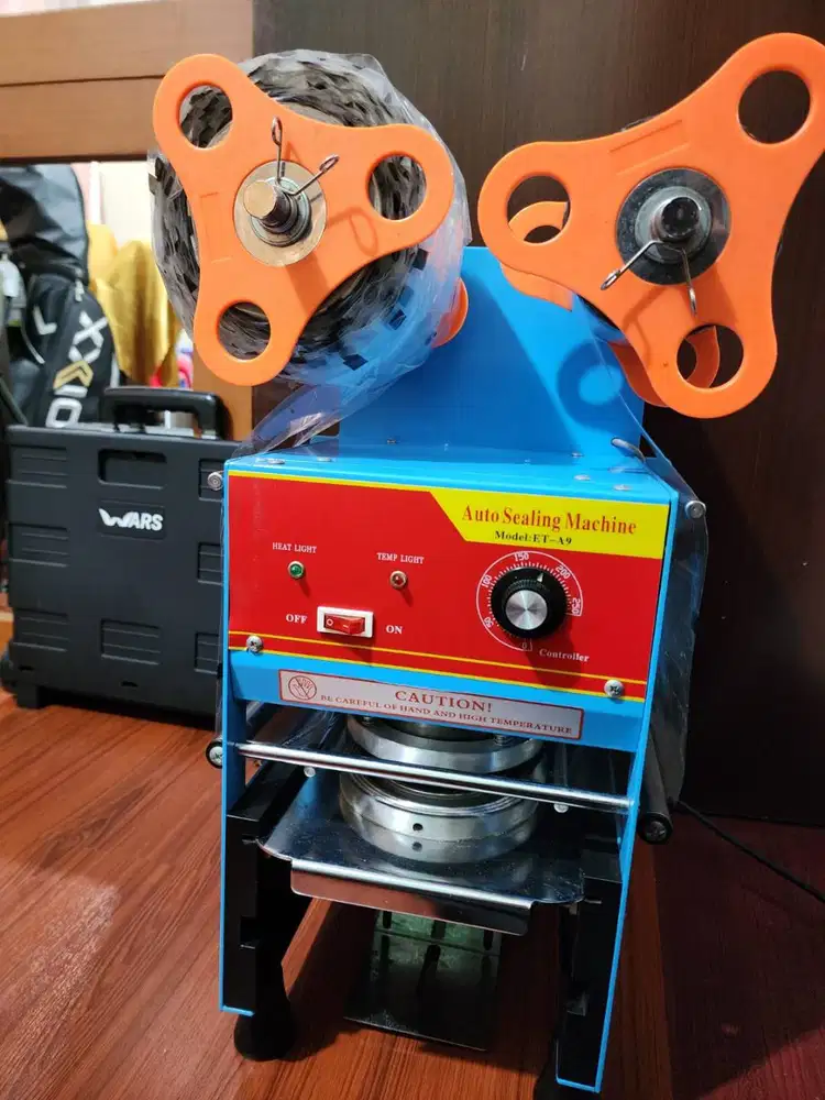 Mesin sealer ice semi otomatis