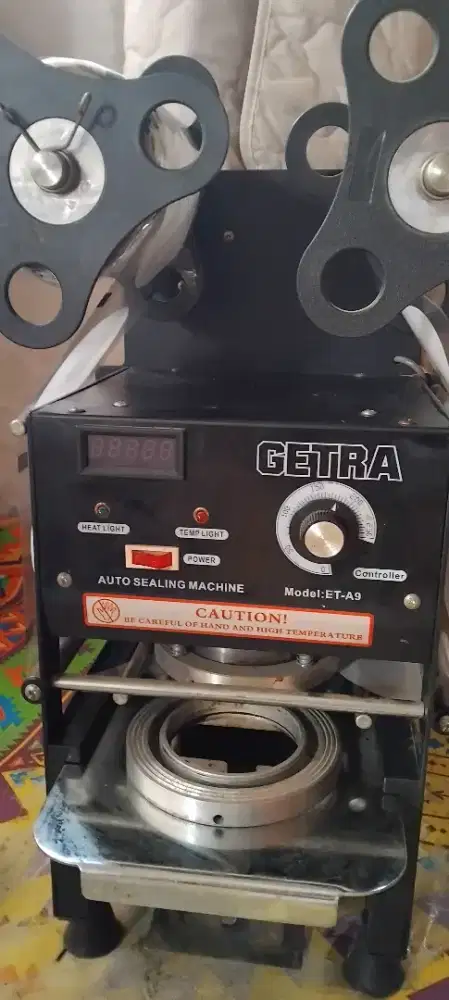 Cup sealer semi otomatis