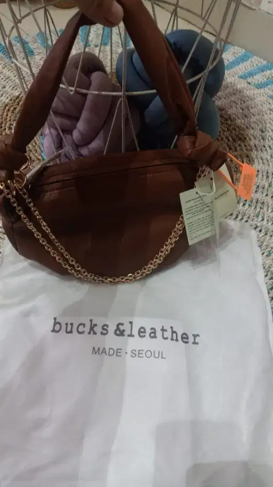 Tas Buck & Leather