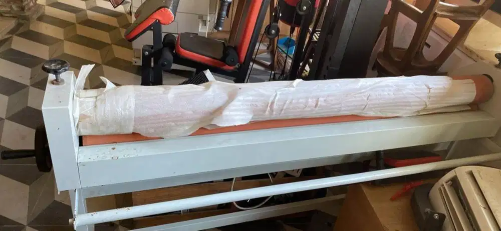 Mesin laminating spanduk  SUN