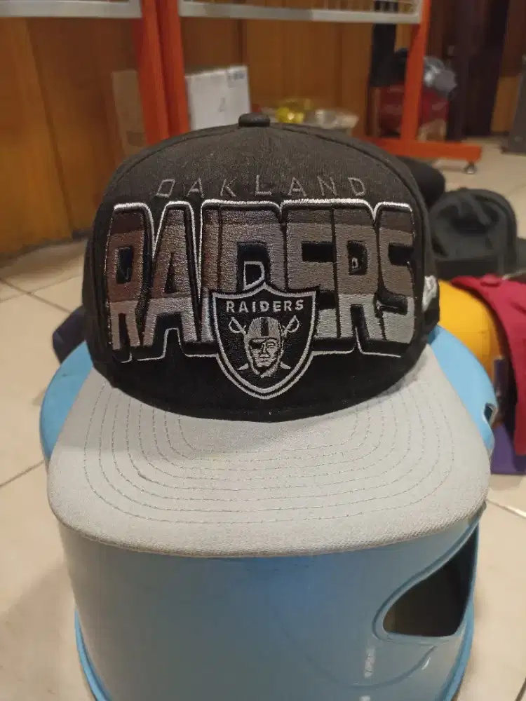 Topi snapback new era raiders