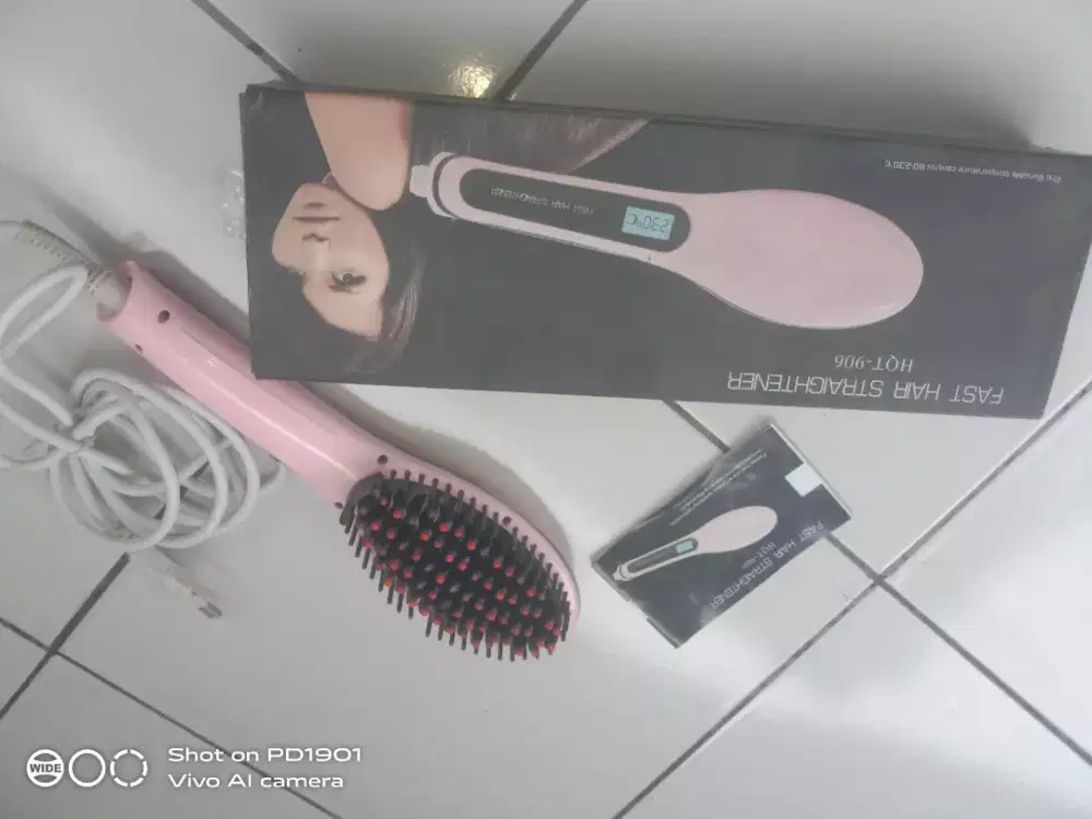 sisir penglurus rambut