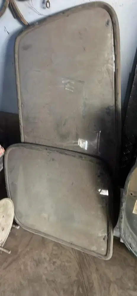 kaca  belakang dan samping isuzu panther