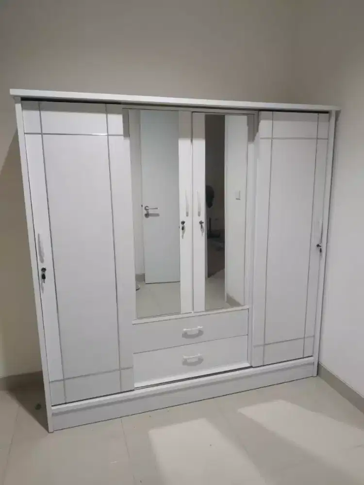Lemari pintu 4 minimalis