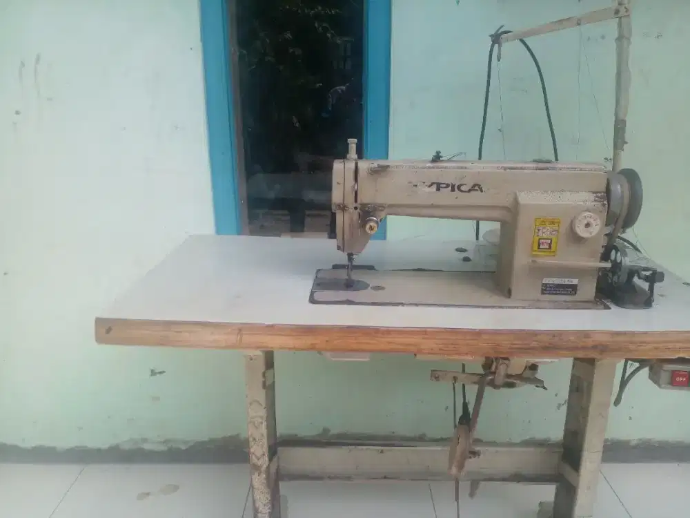 Mesin jahit otomatis istimewa