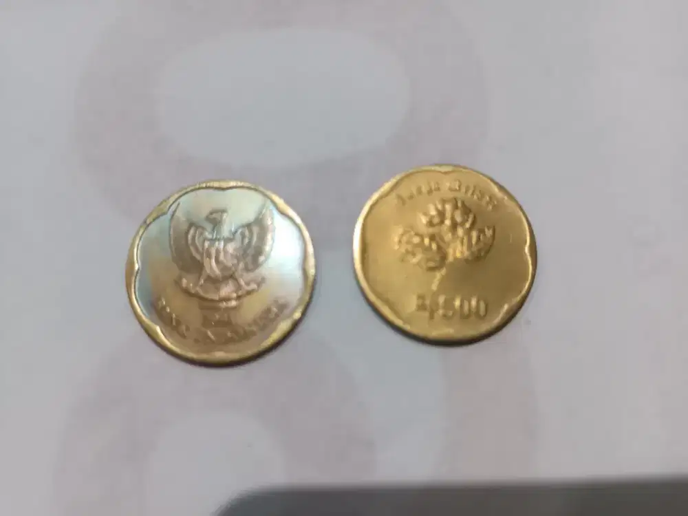 Uang koin emas bunga melati