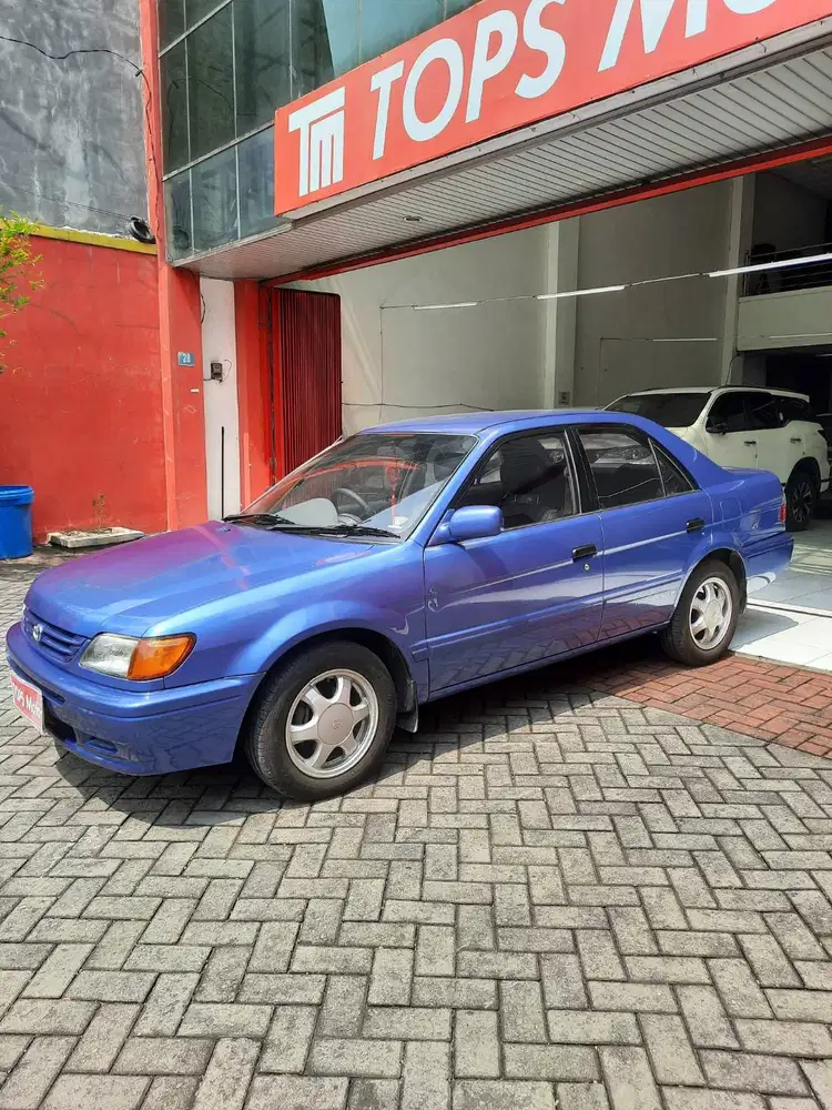 KM12rb CASH100 KOLEKTOR ITEM Toyota Soluna 2001 Biru Manual MT