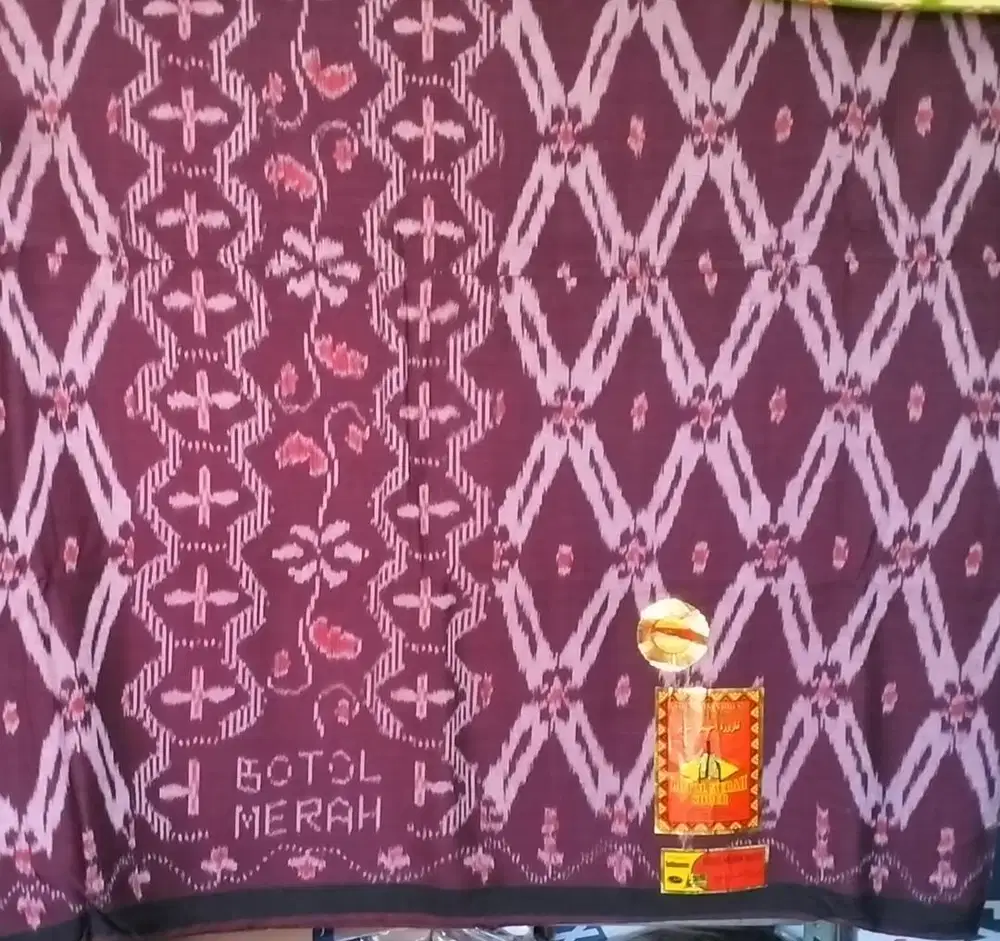 Sarung botol merah/ goyor aslii jahit tengah.