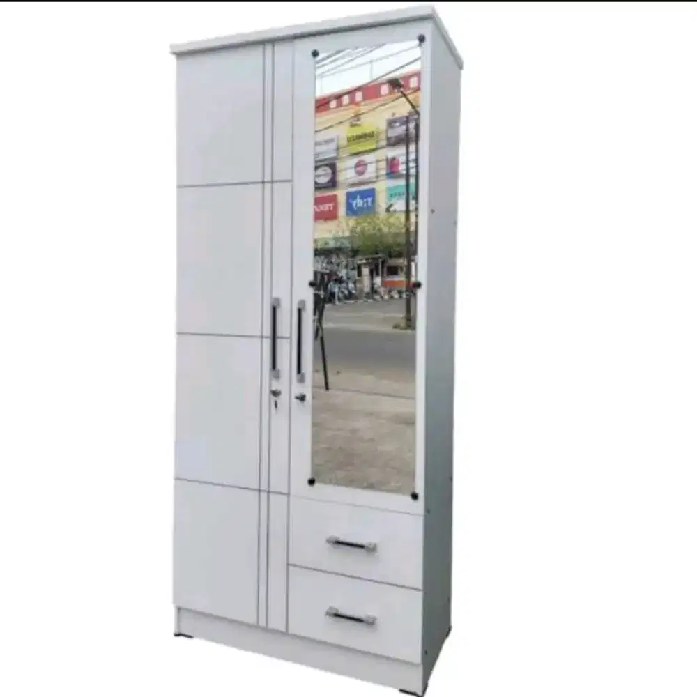 Lemari pakaian 2 pintu ada laci dan cetmin