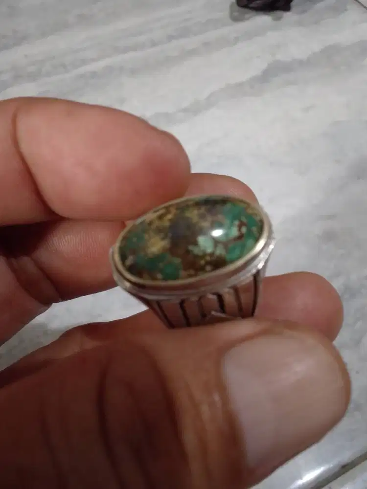 Batu pirus versia ukuran kantor