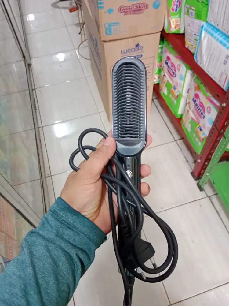 Catokan rambut hand river