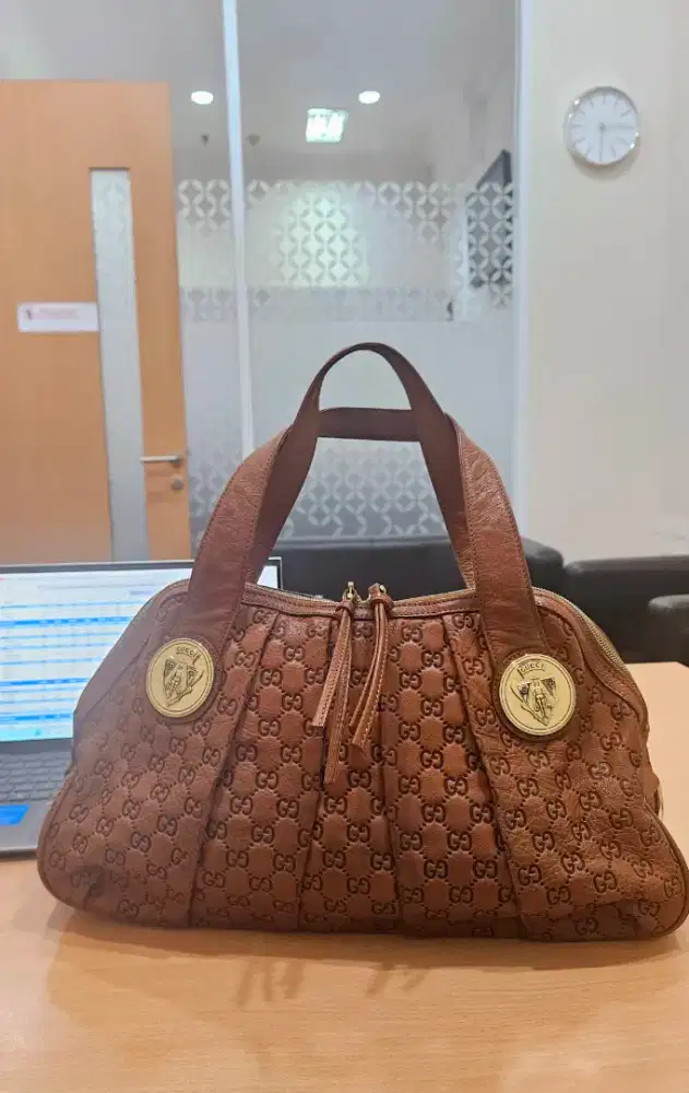 Tas kulit gucci