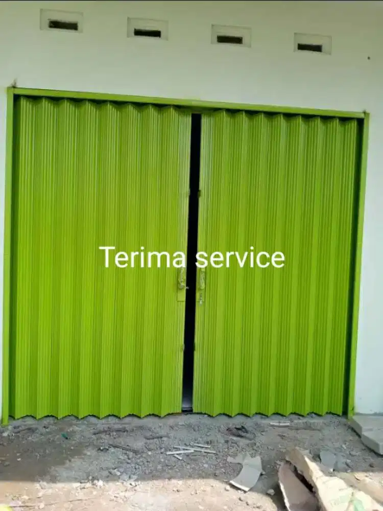 Rolling door folding gate