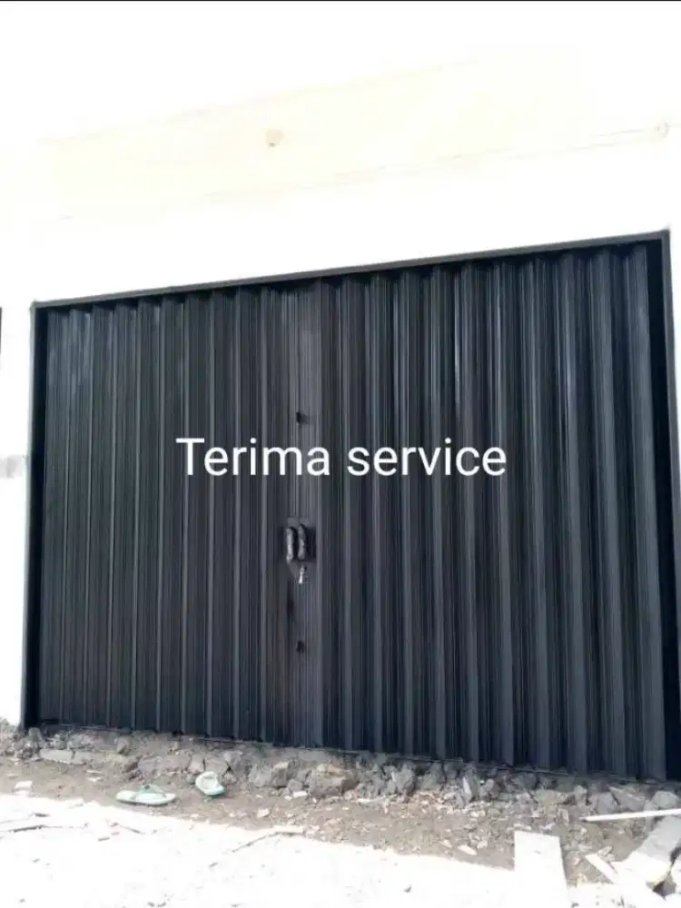 Rolling door folding gate