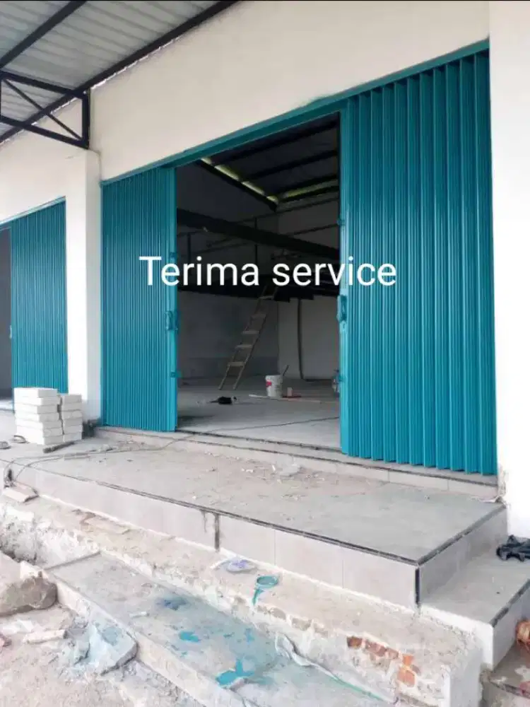 Rolling door folding gate