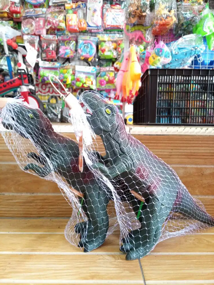 mainan anak dino karet musik