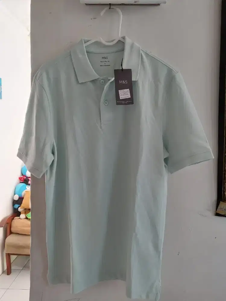 Baju polo laki-laki