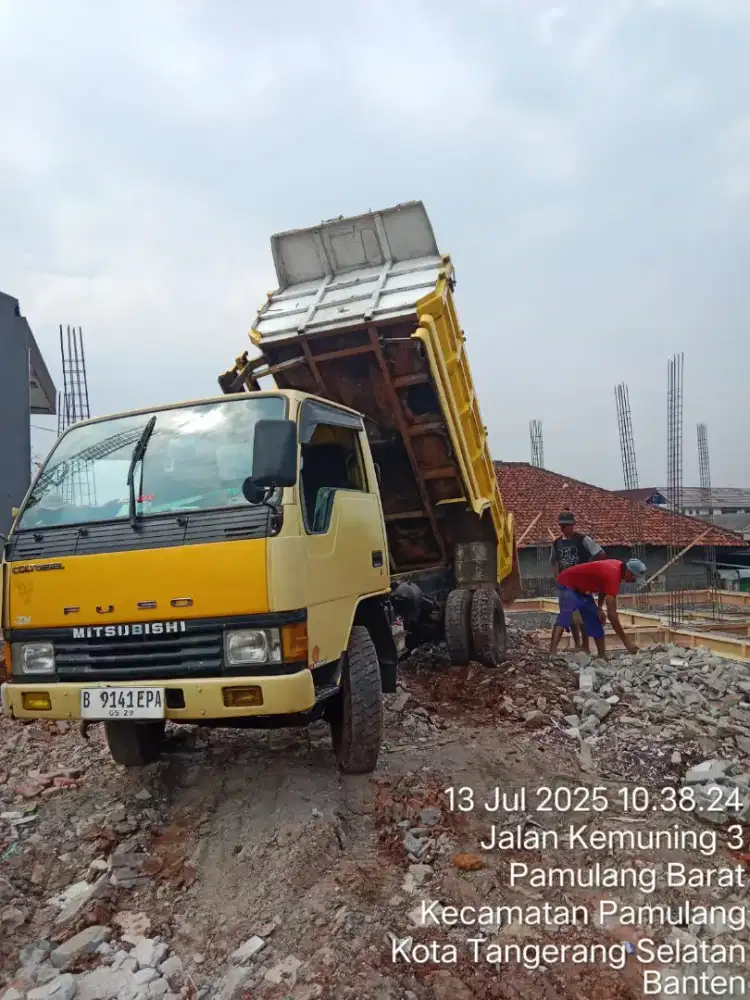 Jasa urugan dan buang puing