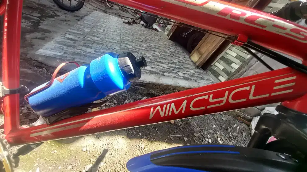 Sepeda 26 in wim cycle bekas merah