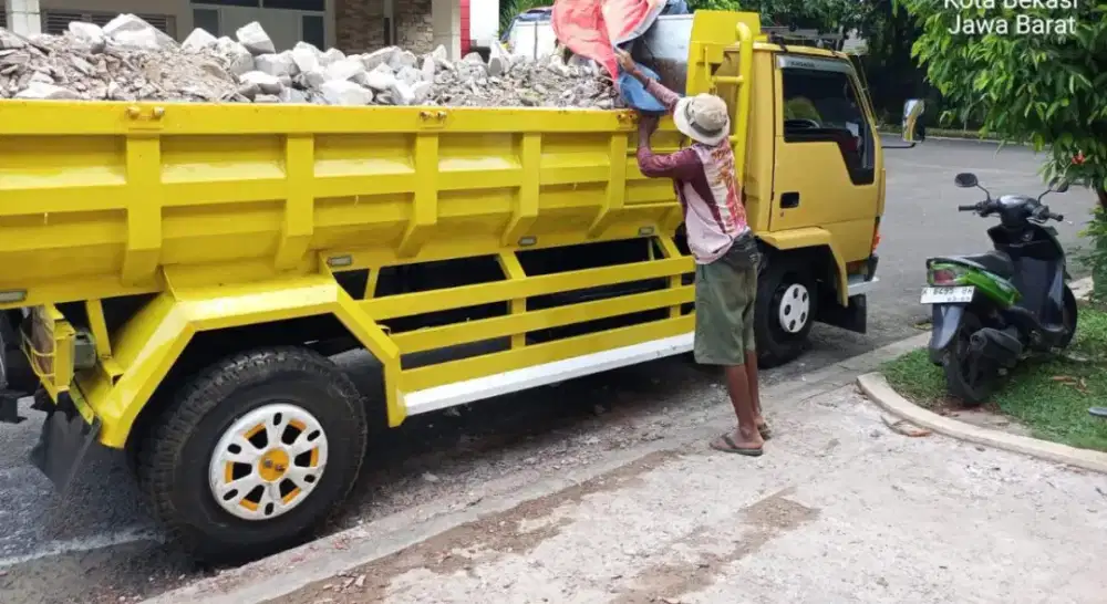 Jasa buang tanah puing dan jual urugan