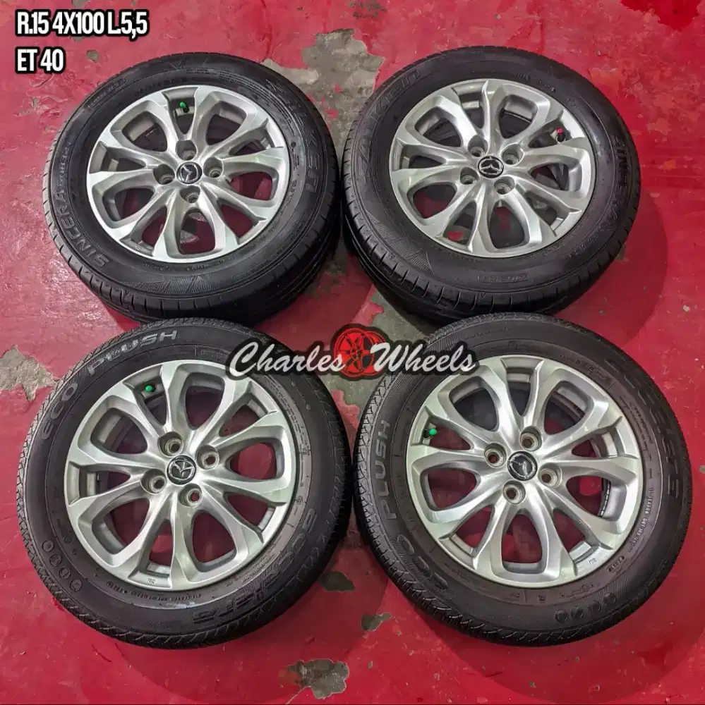 Velg oem mazda 2 r15 4x100 brio agya sigra dll