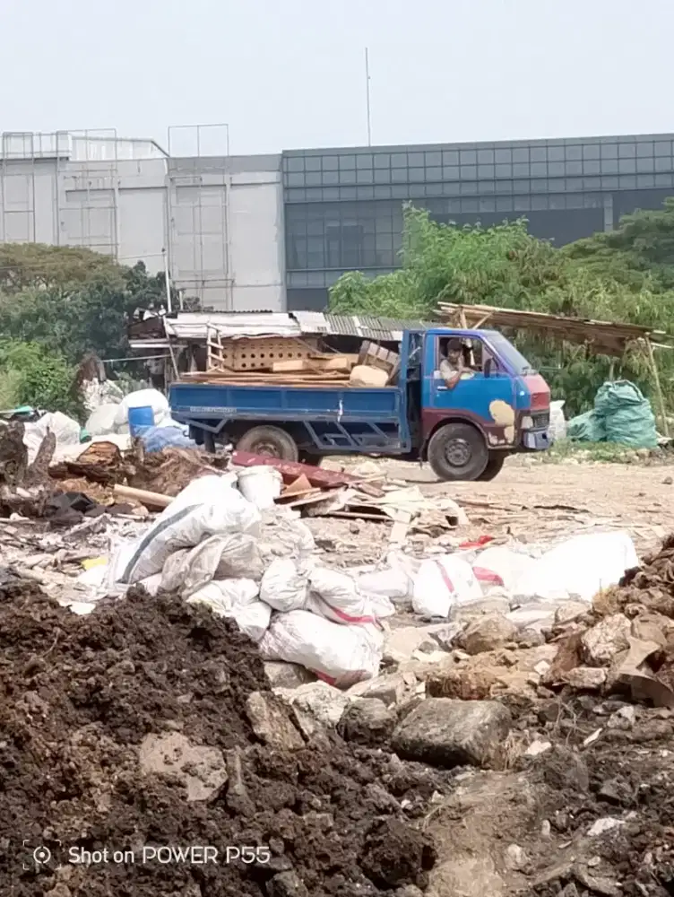 Jasa urugan dan buang puing