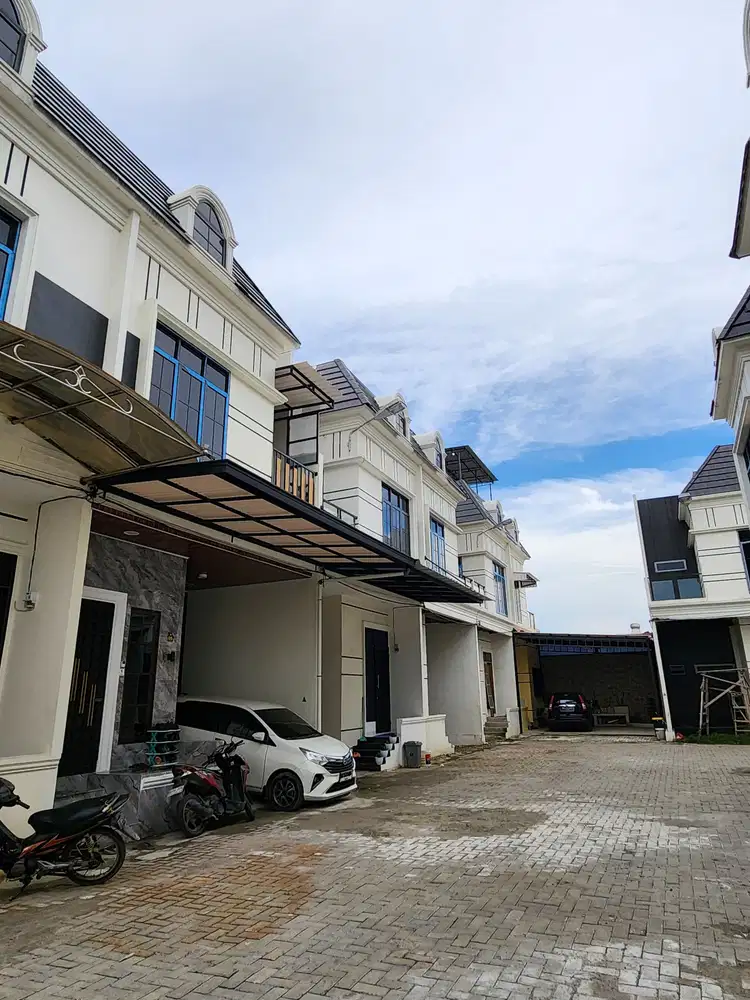 Rumah Komplek Mulia Townhouse Jalan Yos Sudarso Daerah Brayan Krakatau