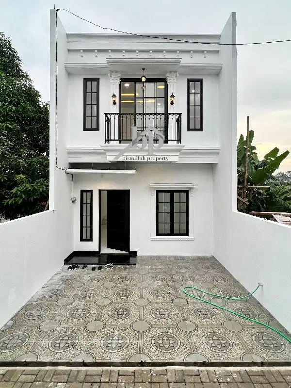 RUMAH MINIMALIS MURAH DEKAT TOL DENGAN BASEMENT DAN ROOFTOP