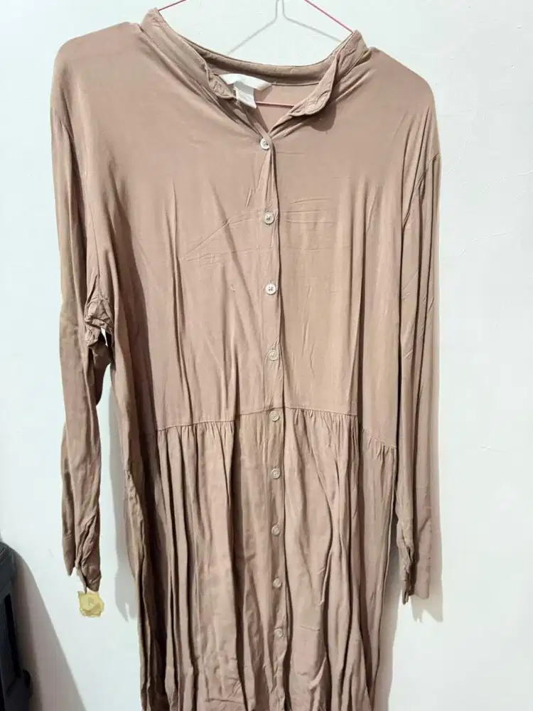 Tunik hnmm size ada di tag